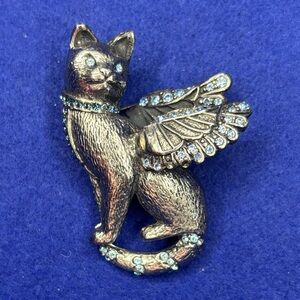 Elegant Silver Cat Brooch with Blue Accents